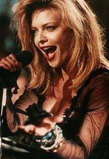 Screenshot of Michelle Pfeiffer portraying her character Susie Diamond in The Fabulous Baker Boys.