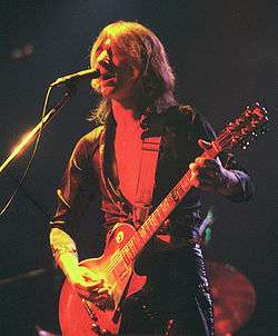 Mick Ralphs performing in 1976.