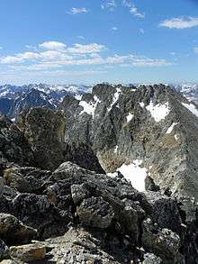 A photo of Mickey's Spire from the summit of Thompson Peak