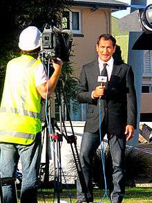 Mike McRoberts broadcasting from the February 2011 Christchurch earthquake