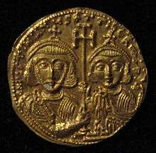 A picture of a gold coin, bearing an image of Tiberius IV and his father Justinian II on its reverse side.