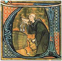 A cellarer testing his wine