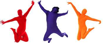 Three people wear Morphsuit costumes. These cover their entire bodies in one colour each: orange, red, and purple. Essentially rendered as a silhouette, they are jumping in front of a white backdrop.