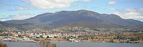 A photo of Hobart from the eastern shore of the Derwent River with Mount Wellington in the background