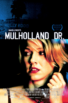 Theatrical release poster showing the film's title against a dark blue image of the Hollywood Sign in Los Angeles atop another still shot of Laura Elena Harring in a blonde wig staring at something off camera toward the lower right corner