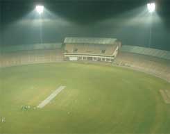 Multan Cricket Stadium at night.