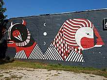Mural by Fefe Talavera in East Atlanta on Flat Shoals Ave.