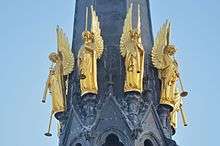 Church spire, with four trumpeting angels