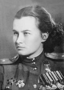 Portrait photograph of Meklin in uniform wearing her Hero of the Soviet Union medal, Order of Lenin, three Orders of the Red Banner, the Order of the Red Star and an order of the Patriotic War