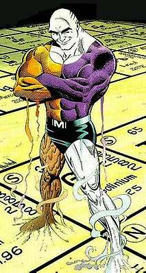 Metamorpho smiling and standing on a periodic table