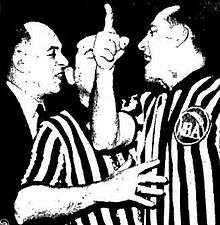 Norm Drucker ejecting Red Auerbach