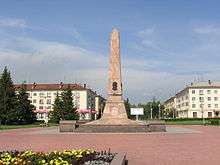 An obelisk in a park