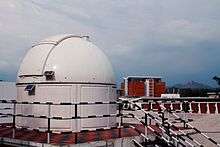 The Observatory at IIST with an 8-inch Celestron telescope. The library building can be seen in the background