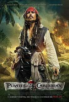 The film's main character Jack Sparrow stands on a beach. He wears a red bandana, a dark blue vest with a white shirt underneath and black pants. Attached to his belt are two guns and a scarf. A ship with flaming sails is approaching from the sea. In the background, three mermaids are sitting on a rock. The names of the main actors are seen atop the poster, and the film credits are at the bottom.