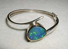 An opal armband. Opal is the birthstone for October.