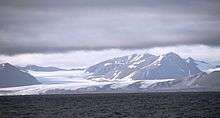 "View of Eidembreen glacier from the southernmost coast of Oscar II Land."
