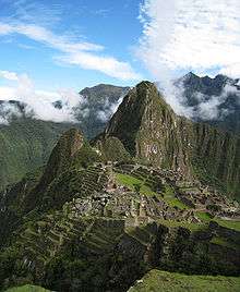 An overhead view of Machu Picchu showing the ancient ruins