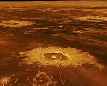 The plains of Venus are outlined in red and gold, with impact craters leaving golden rings across the surface