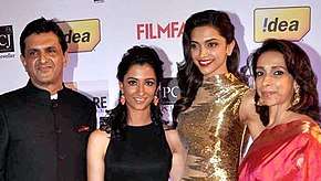 Deepika Padukone is posing with her father, mother, and sister
