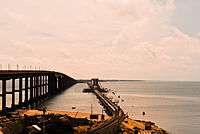cantilever iron bridge for rails and concrete road bridge on the backwaters of Bay of Bengal.