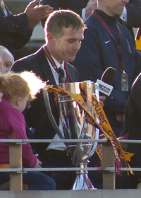 Phil Parkinson with the League Two play-off trophy in 2013.