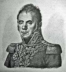 Black and white print of glum-looking man with wavy hair. He wears a Napoleonic-era military uniform with epaulettes and lots of gold lace.