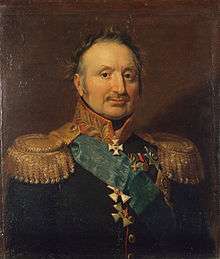 Painting shows a balding man with a moustache. He wears a very dark military uniform with gold epaulettes and several decorations.