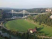 Scenic view of a white, cable-stayed bridge
