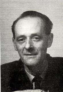 A portrait photograph of John Gollan.