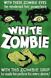 Image of a film poster with a dark green background. Large eyes overlook two hands clasped together. The text at the top reads "With these zombie eyes, he rendered her powerless". In the middle is the title, White Zombie. Below is written "With these zombie hands he made her perform his every desire!".
