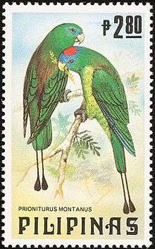 Stamp with drawing of two green parrots with yellow chest and orange back, one with blue face and red crown
