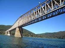 Rail bridge across the wide Maule River