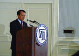 Chen Ding-nan, Minister of Justice of the Republic of China (Taiwan) delivering a speech in front of a lectern holding the logo of "The National Association of Attorneys General" (NAAG), during his state visit lasting from 9-13 July 2002.