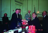 Chen Ding-nan, Minister of Justice of the Republic of China (Taiwan) posing for a picture while shaking hands with John Ashcroft, Attorney General of the United States of America, on 13 July 2002 during the state visit in Washington, D.C.