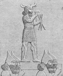 Assyrian soldiers of Ashurbanipal carrying a statue of Adad