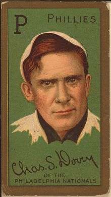A baseball-card image of a red-haired man in a white old-style baseball jersey and cap