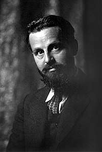 Portrait photograph of author Rex Stout at age 35, photographed by Arnold Genthe