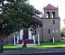 Exterior view of the mission revival style Riverside Baptist Church building in Riverside, California