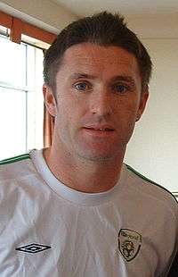 Robbie Keane in his white Ireland shirt