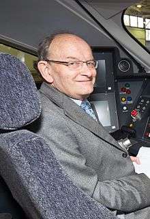 Roger Ford in the cab of class 800002 at North Pole Train Maintenance Centre, 2015
