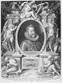 A round-faced bearded man wearing a crown of laurel