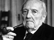 Photograph of Bultmann in old age, smoking a pipe