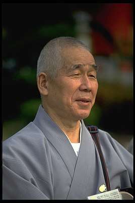 A priest from the Japanese Tendai school of Buddhism looking right