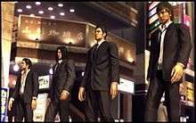 Game screenshot of four young men in suits