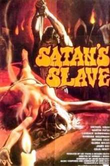 A poster for the film "Satan's Slave". It shows a man armed with a dagger about to stab a naked woman who is tied to a stone altar. In the background, a group of hooded figures look on with lit torches in hand.