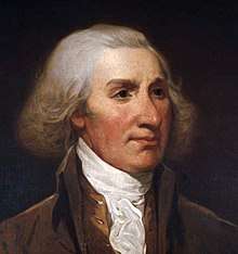 A color image of an oil portrait of a man with neck-length white hair in an 18th-century coat and ruffle