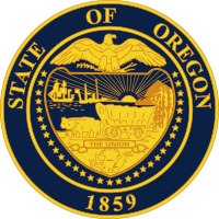 A navy blue seal with gold lettering and imagery. The seal contains a shield, supported by 33 stars and with an eagle with its wings spread on top; "STATE OF OREGON" is written above the eagle and "1859" appears below the shield. Within the shield appear a sun with its rays extending to two ships and a mountain and trees, two oxen pulling a covered wagon, and a ribbon containing "THE UNION".