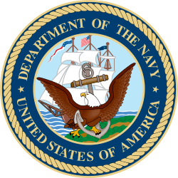 Round seal with a bird in front. Words around the edge say Department of the Navy, United States of America