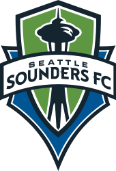 The Seattle Sounders FC crest, with the team's name on a banner stretched across a green and blue shield with the shape of the Space Needle in the center.