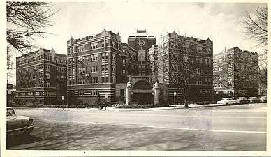 Historic black and white photo of Art Deco apartment building